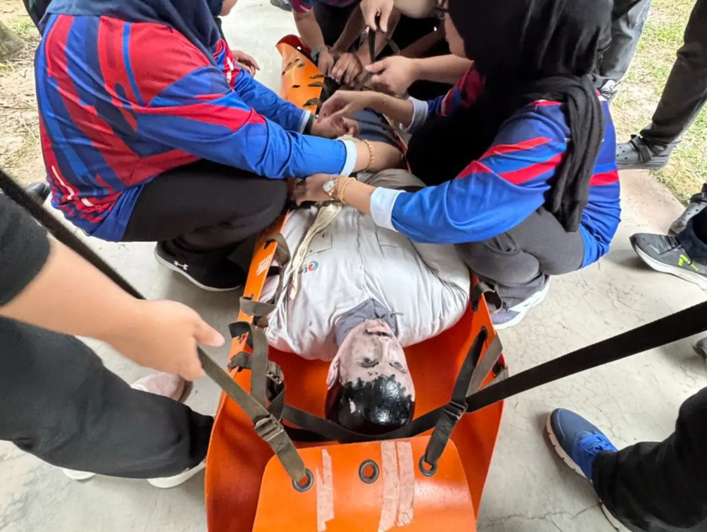 Emergency Response Team participants practising a simulated workplace emergency response exercise